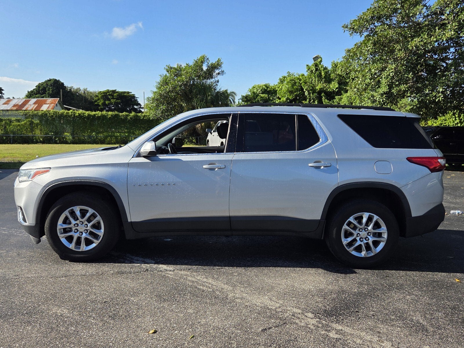 Used 2021 Chevrolet Traverse 1LT with VIN 1GNERGKWXMJ135788 for sale in Belle Glade, FL