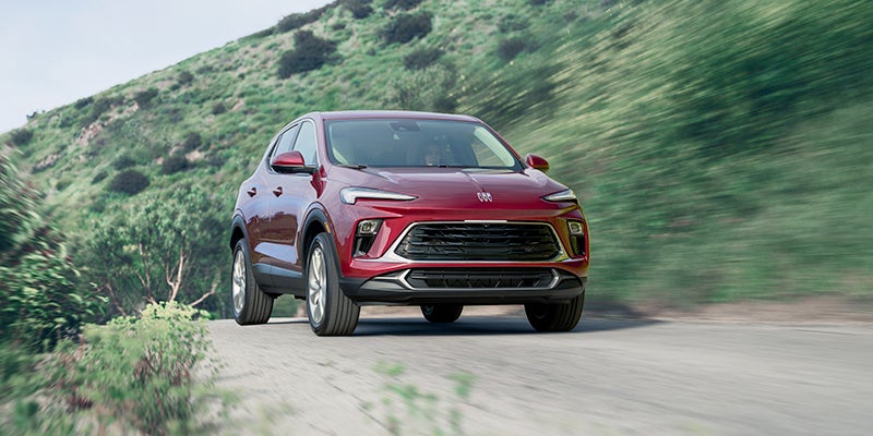 red Buick Encore-GX on a road